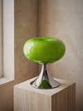 Rondo, a green glass dome on a polished chrome trumpet base, unlit